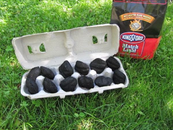 Carry a portable charcoal grill
